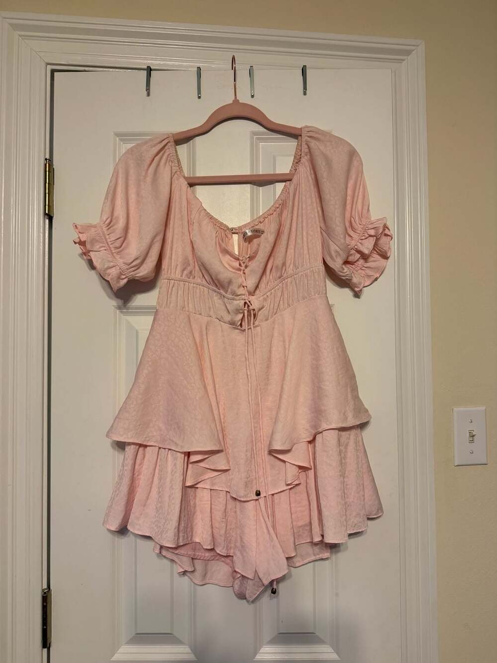 Saints + Secrets pink tiered ruffle romper